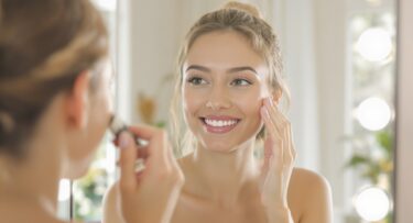 Confident woman with natural makeup walking forward